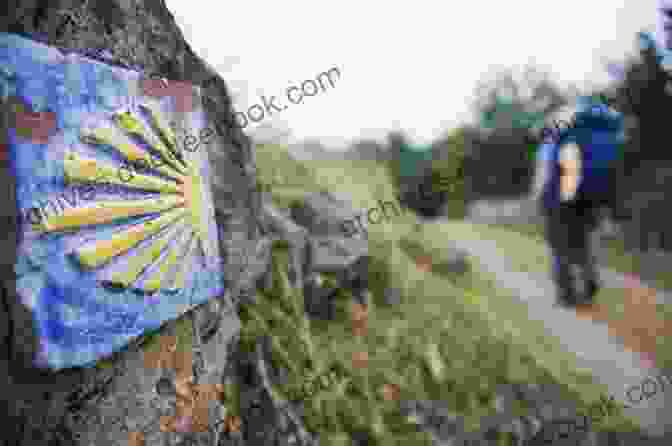 A Group Of Pilgrims Walking And Talking On The Camino De Santiago The Way Of The Wind: Embracing Life While Walking The Camino De Santiago