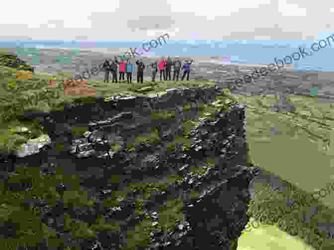 A Hiker On The Summit Of Ben Bulben, Overlooking The Sligo Countryside. Donegal Sligo Leitrim: A Walking Guide