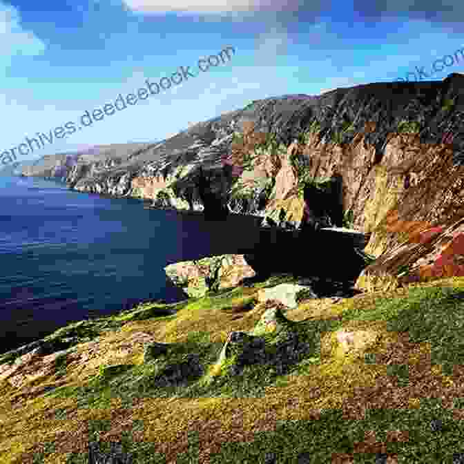 A Hiker Standing On The Edge Of The Slieve League Cliffs, Overlooking The Wild Atlantic Ocean. Donegal Sligo Leitrim: A Walking Guide