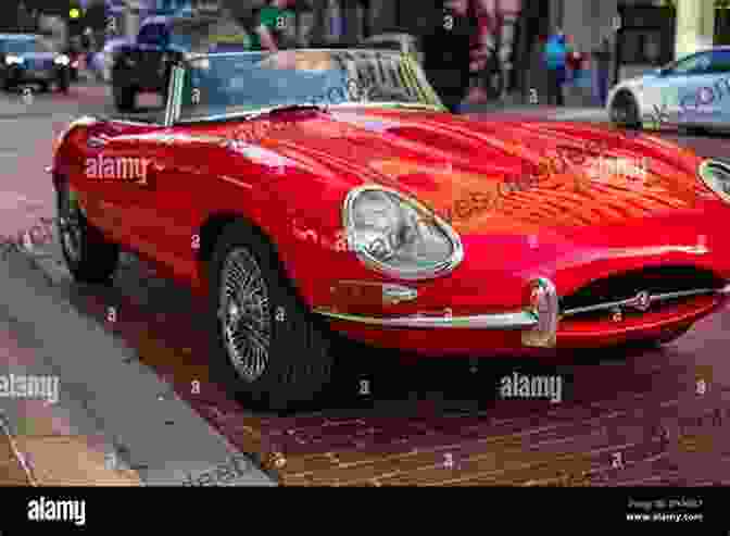 A Sleek Red Classic Car Parked In A Field Automotive Arousal: A Collection Of Classic Car Stories