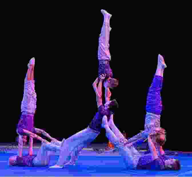 Acrobats Performing A Breathtaking Trapeze Routine Under The Big Top Under The Big Top: A Season With The Circus