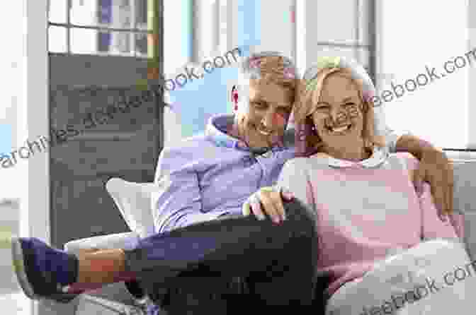 An Elderly Couple Sitting On A Couch At Home, Looking Solemn Stand Up To Elder Financial Abu$e