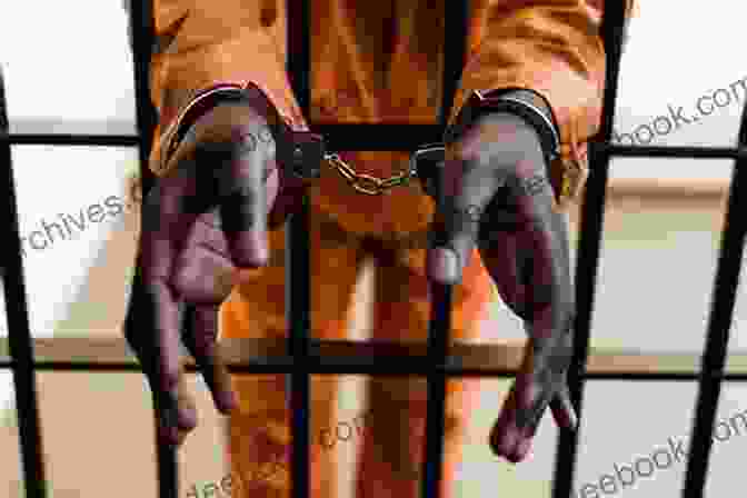 An Image Of A Person In Handcuffs, Symbolizing The Economic Disparity In The American Justice System Our American Injustice System: A Toxic Waste Dump Also Known As The World S Largest Crime Syndicate