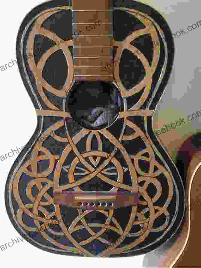 Close Up Of El McMeen's Guitar With Intricate Celtic Carvings Celtic Guitar Treasures El McMeen