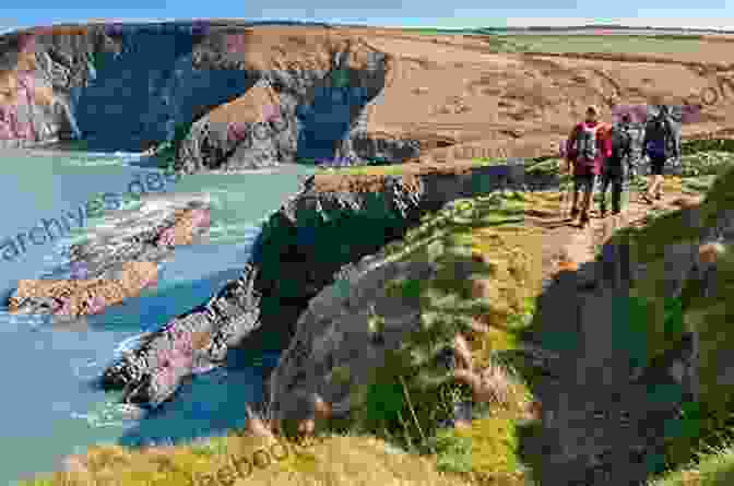 Hikers Walking Along The Wales Coast Path, Wales Walking Great Britain: England Scotland And Wales