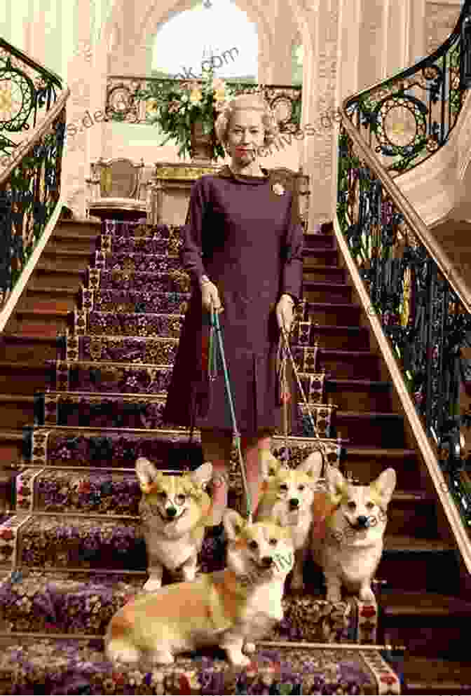 Queen Elizabeth II Surrounded By Her Pets The Queen And Her Cat